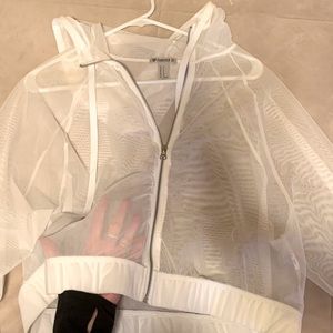 Mesh white crop worn as sweatshirt/ athletic/ concert attire